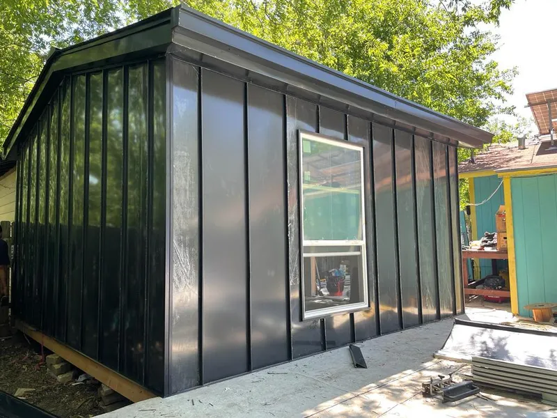 Black standing seam metal wall panels for Roof Inspection in Winslow